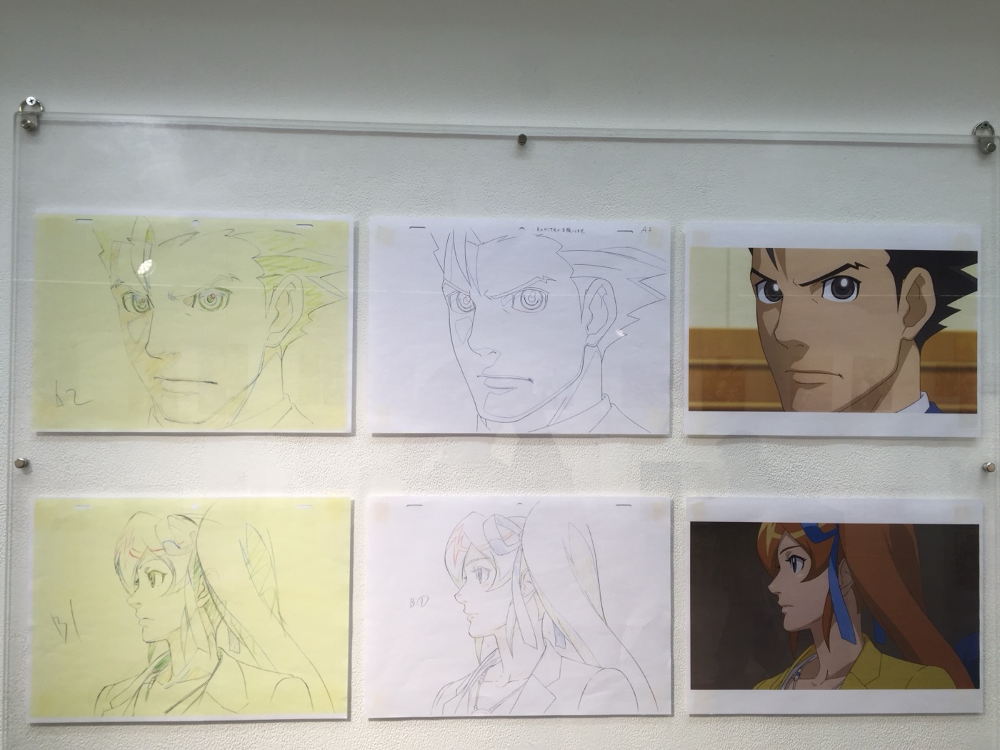 Sketches of Phoenix and Athena alongside the finished art